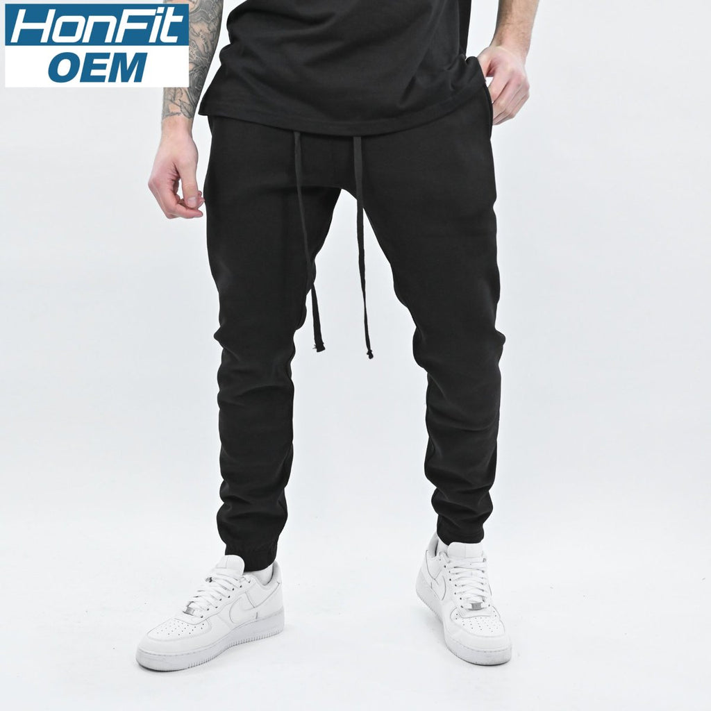 Mens Fitness Sportswear 30% cotton 70% polyester Jogger Pants FY-CK098 print logo 7