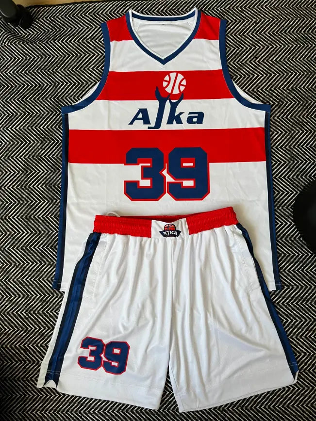 Varsity basketball uniform kit red and white with game shorts and custom number 38