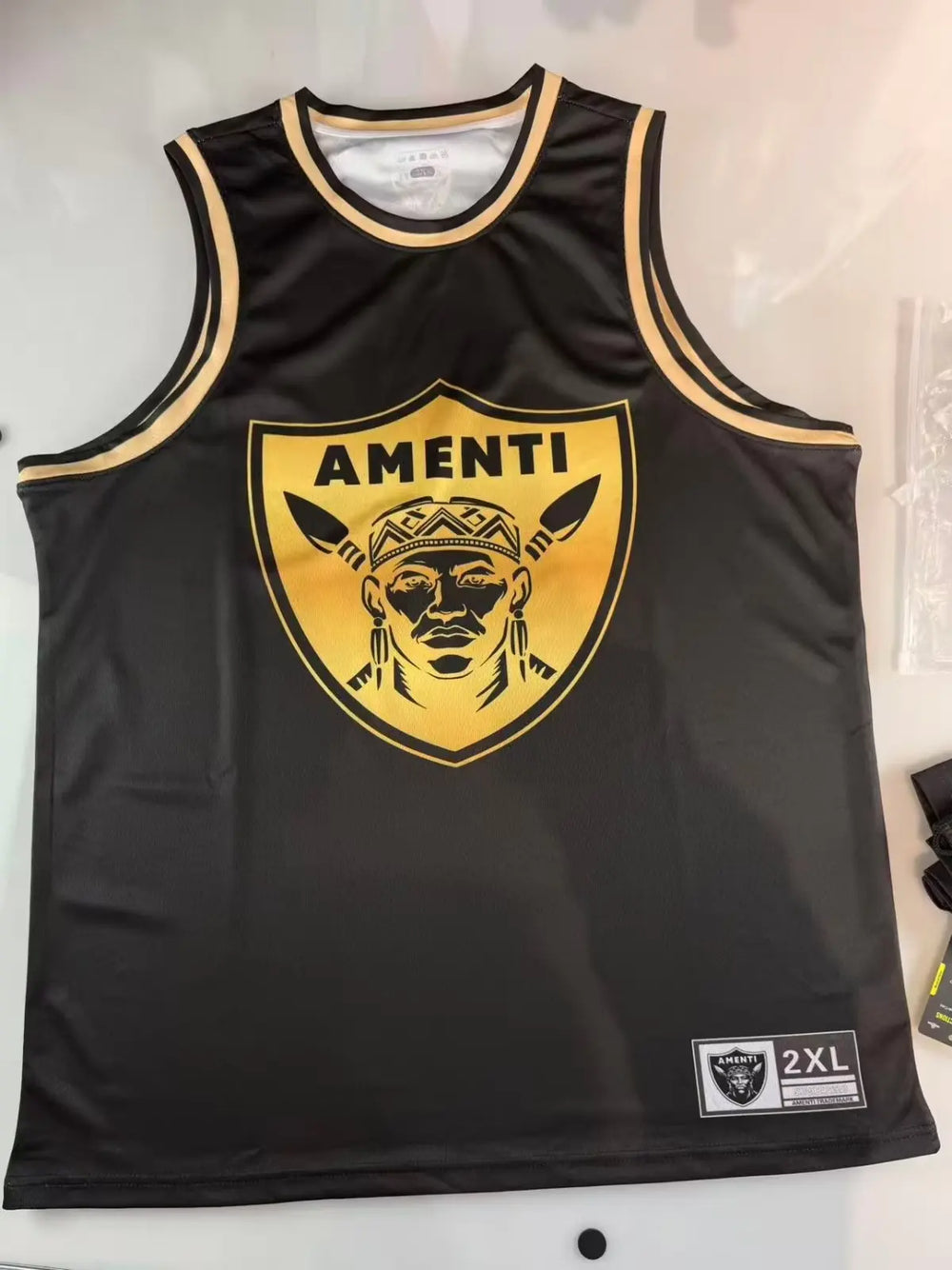 Custom blackout sublimated basketball jersey with high-definition team mascot logo