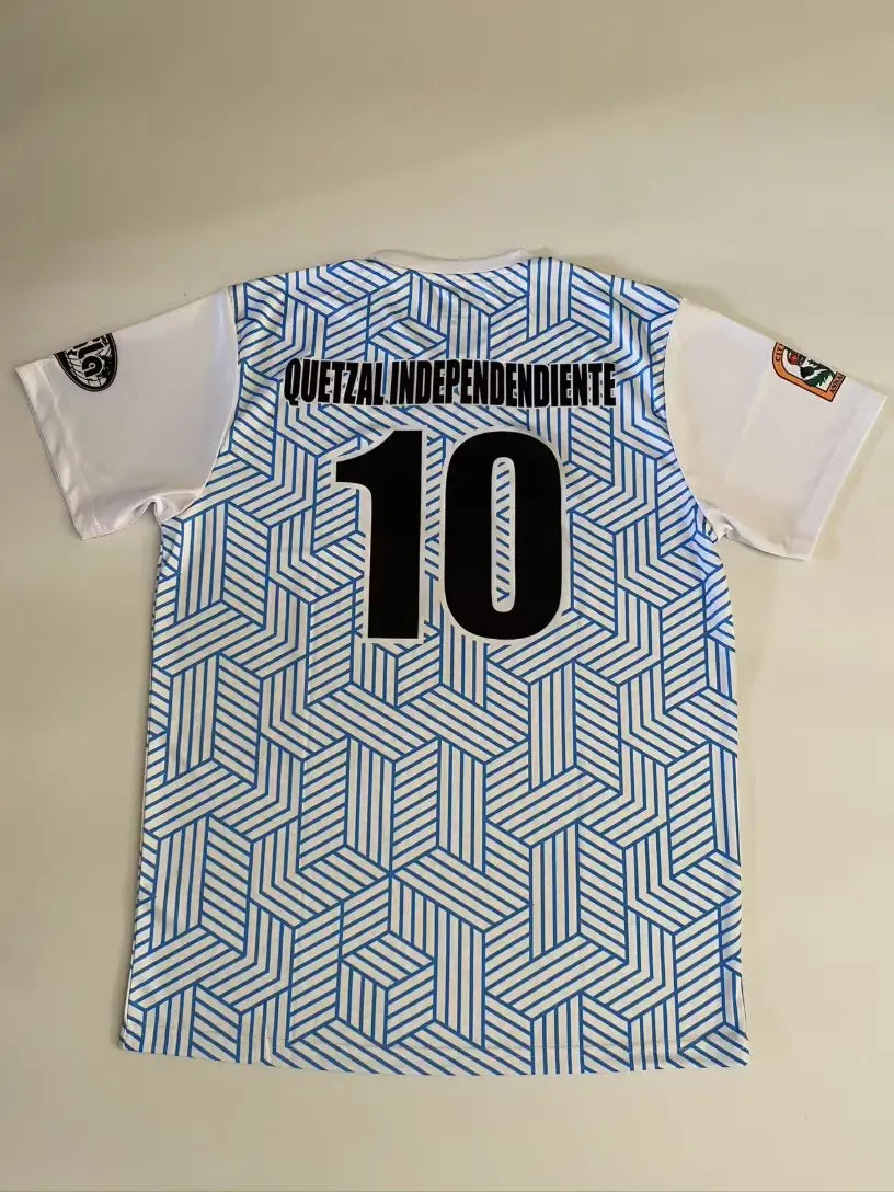 Sky blue geometric patterned soccer jersey with black number 10