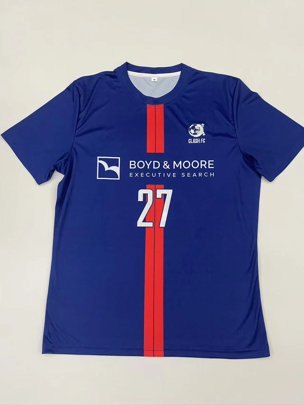 Navy blue custom soccer jersey with red center stripe and number 27